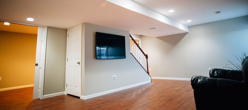 The homeowners wanted to use their unfinished basement for a family room and a place for their children to play.